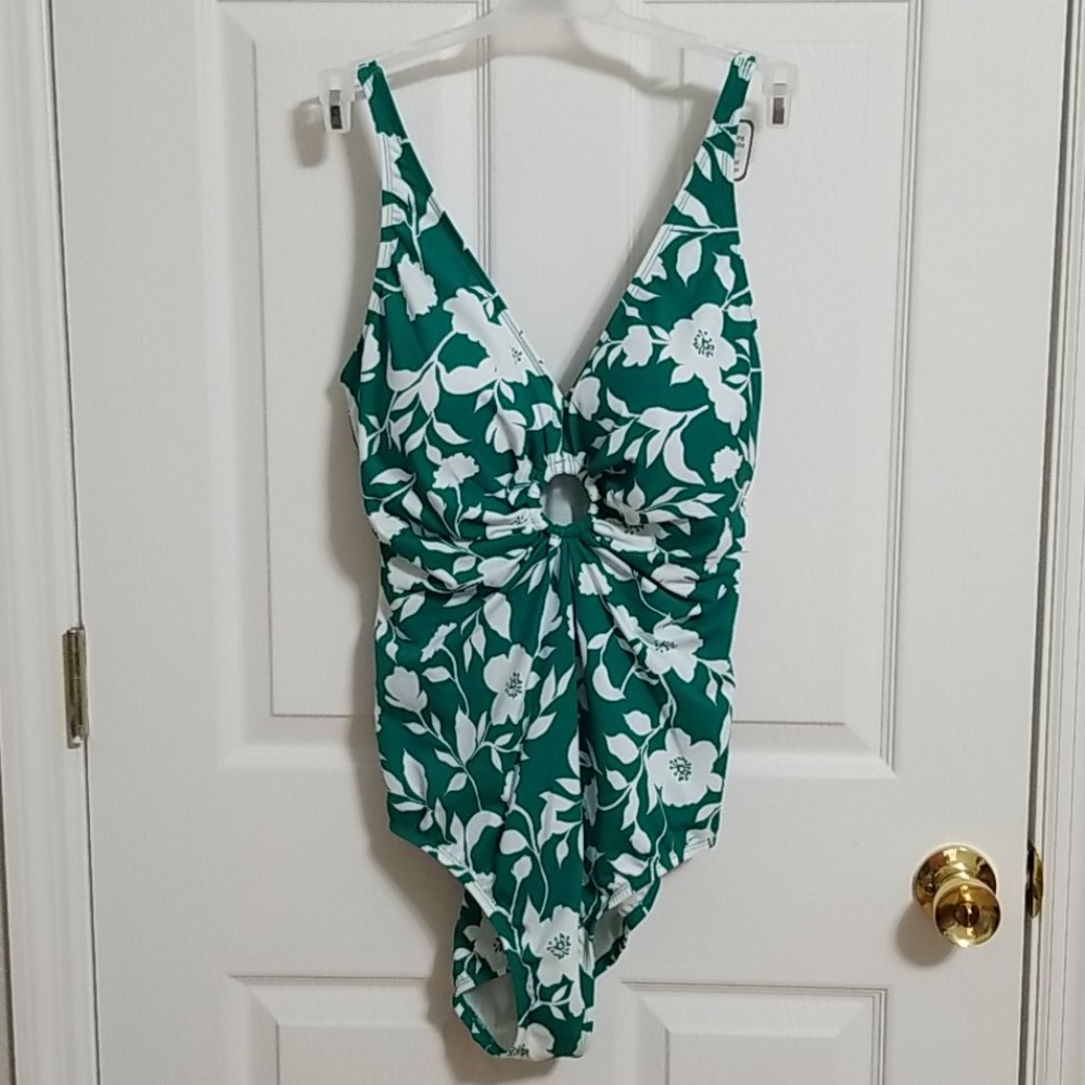 Green and white bathing suit